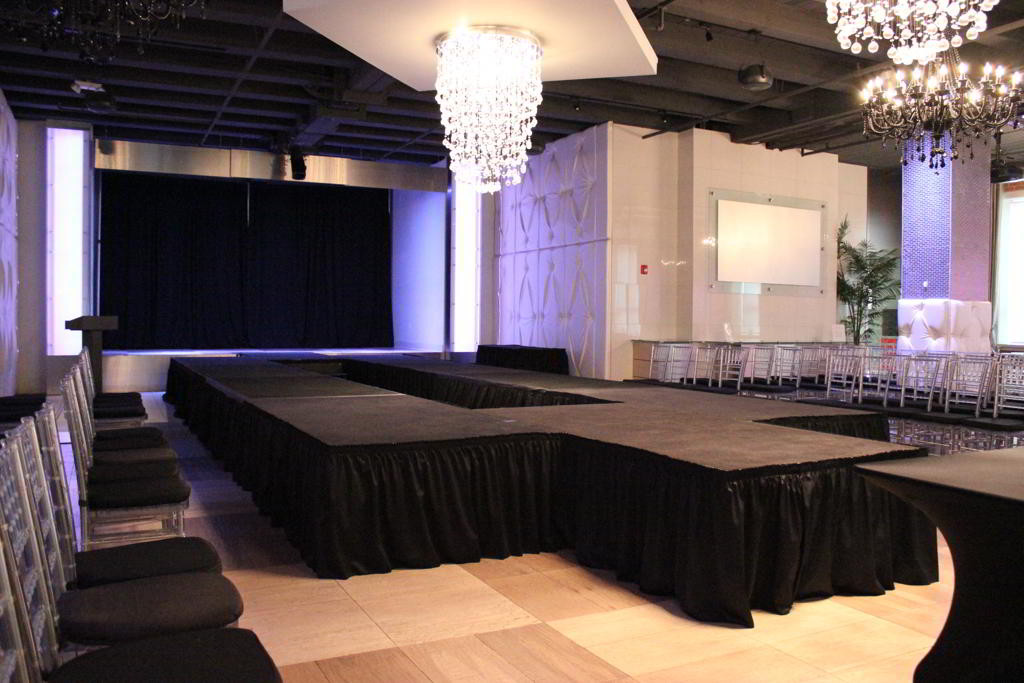 unique stage, oval stage, stage skirting, tendanza, event stage, fashion show stage, runway stage