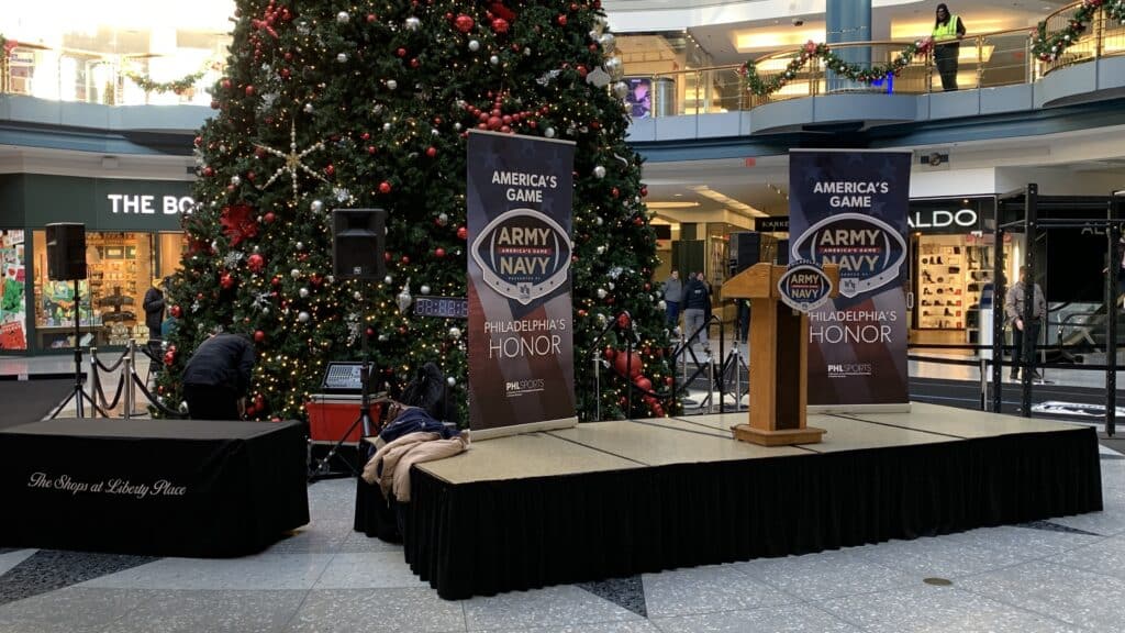 projection, screen, audio visual, ballroom, pep rally, army navy game, army, navy, podium, shops at liberty, liberty place
